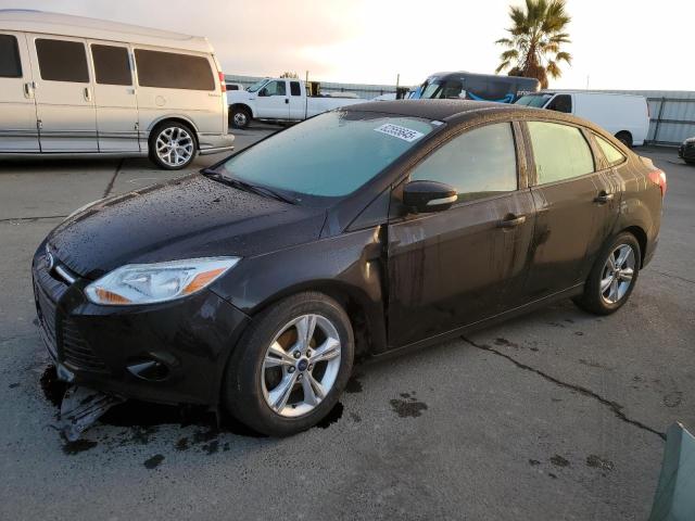 FORD FOCUS SE 2014 with VIN 1FADP3F23EL165270 - Photo from auction