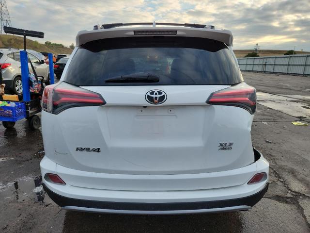 Photo 6 from auction – 2017 TOYOTA RAV4 XLE with VIN JTMRFREV7HD200876
