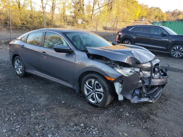 Photo 4 from auction – 2017 HONDA CIVIC LX with VIN 19XFC2F51HE232836