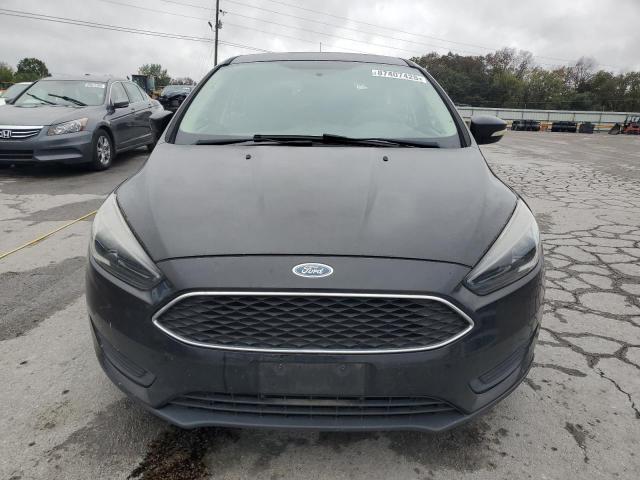 Photo 5 from auction – 2015 FORD FOCUS SE with VIN 1FADP3K22FL295113