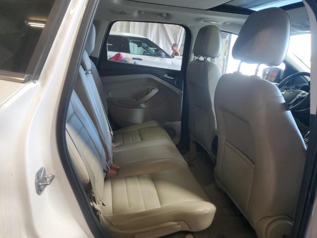 Photo 11 from auction – 2014 FORD ESCAPE TIT with VIN 1FMCU9JX2EUB70356
