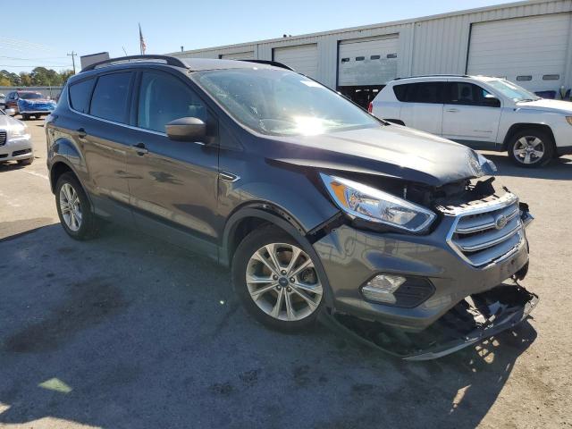 Photo 4 from auction – 2018 FORD ESCAPE SE with VIN 1FMCU9GD9JUC24744