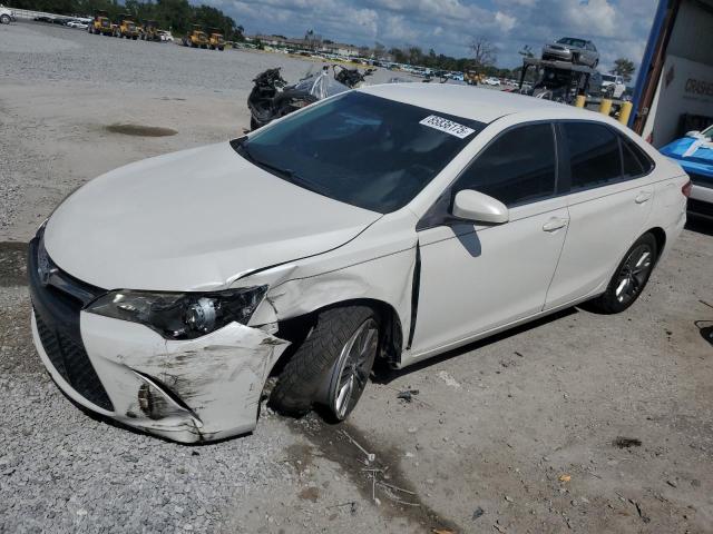 TOYOTA CAMRY LE 2017 with VIN 4T1BF1FK3HU409986 - Photo from auction