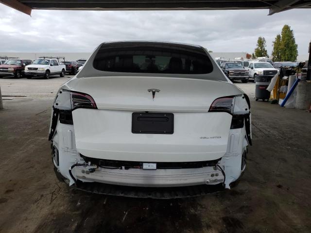 Photo 6 from auction – 2023 TESLA MODEL Y with VIN 7SAYGDEEXPF619004