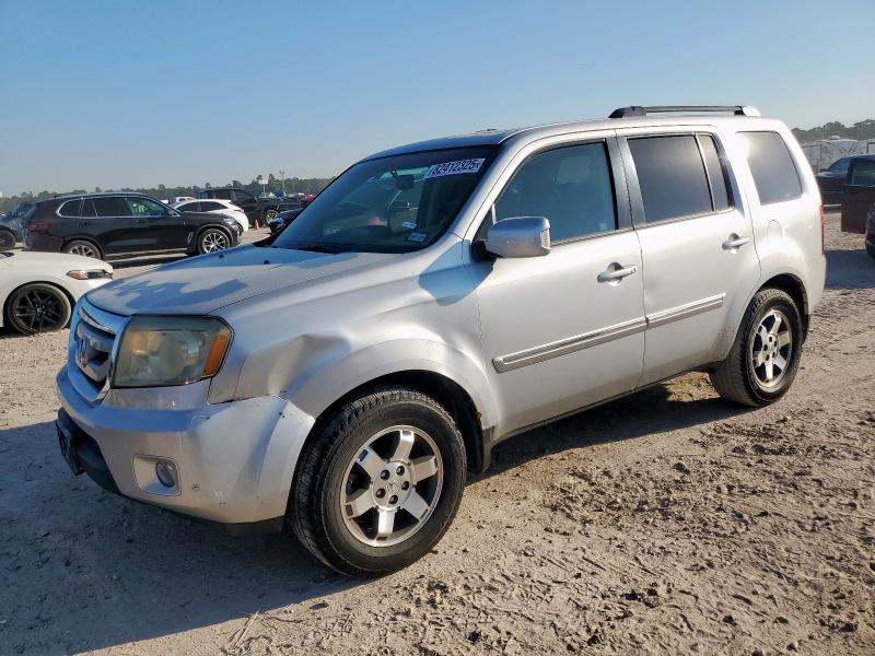 HONDA PILOT TOUR 2011 with VIN 5FNYF4H96BB025422 - Photo from auction