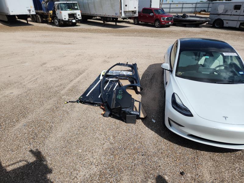 Photo 12 from auction – 2022 TESLA MODEL 3 with VIN 5YJ3E1EB5NF114955