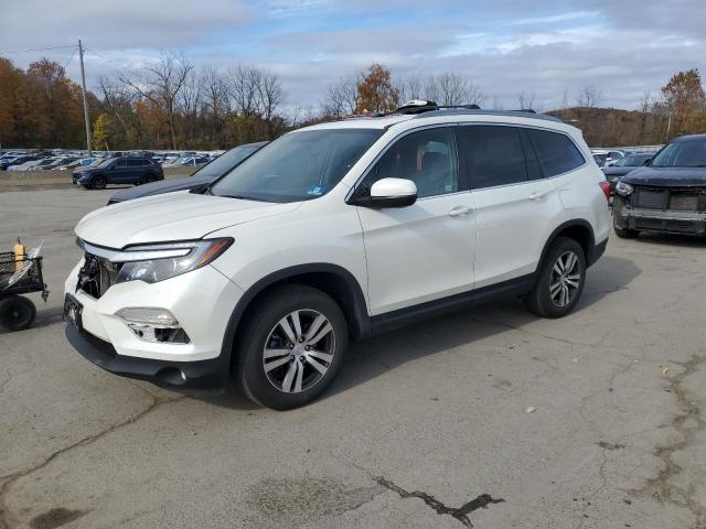 HONDA PILOT EXLN 2016 with VIN 5FNYF6H79GB084742 - Photo from auction