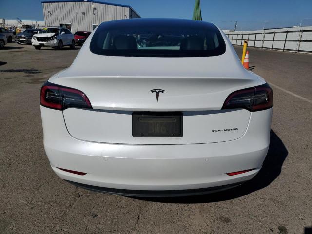 Photo 6 from auction – 2021 TESLA MODEL 3 with VIN 5YJ3E1EB0MF052007