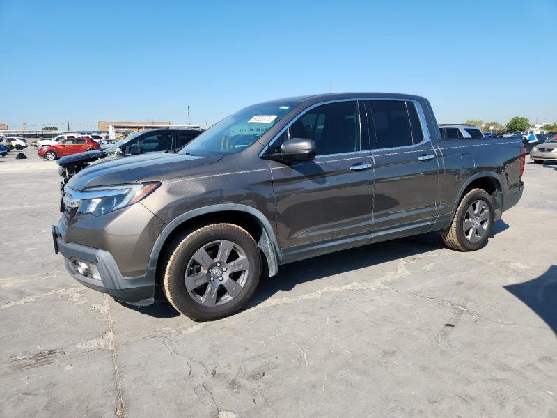 HONDA RIDGELINE 2020 with VIN 5FPYK3F72LB011694 - Photo from auction