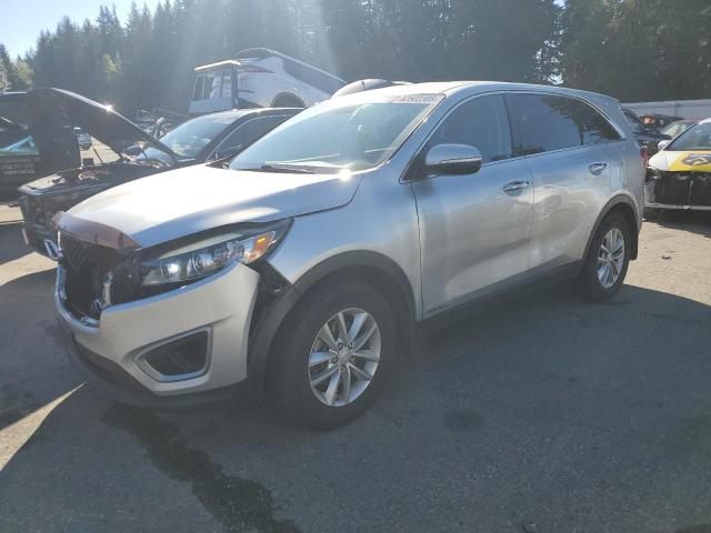 KIA SORENTO LX 2016 with VIN 5XYPG4A37GG019014 - Photo from auction