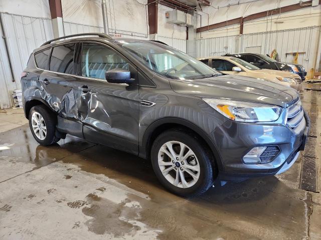 Photo 4 from auction – 2018 FORD ESCAPE SE with VIN 1FMCU9GD3JUC28921