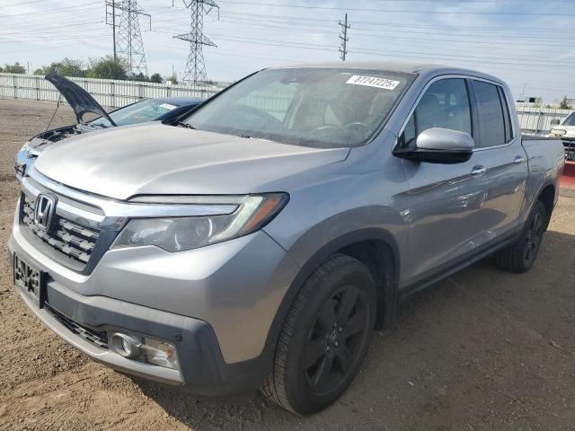 HOND RIDGELINE RTL 2017 con VIN 5FPYK3F73HB037180 - Foto de la subasta