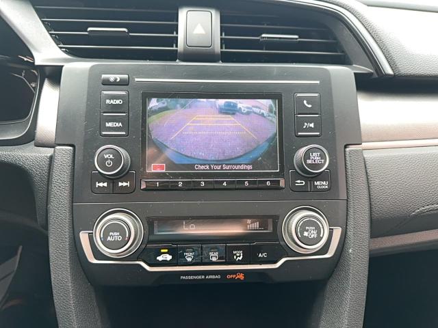 Photo 12 from auction – 2016 HONDA CIVIC LX with VIN 19XFC2F59GE216902