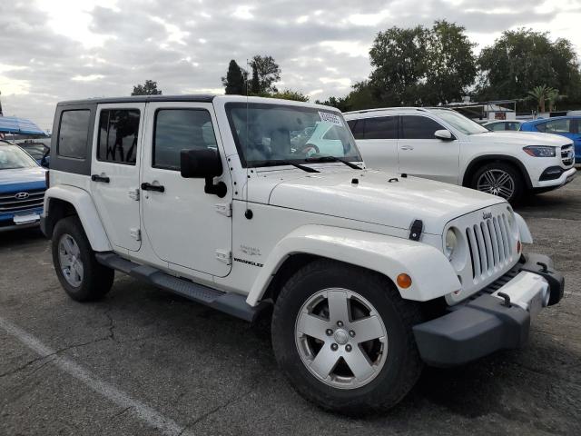 Photo 4 from auction – 2010 JEEP WRANGLER U with VIN 1J4BA5H12AL231394