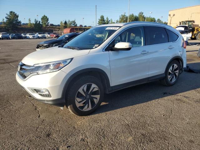 HONDA CR-V TOURI 2016 with VIN 5J6RM4H97GL100069 - Photo from auction