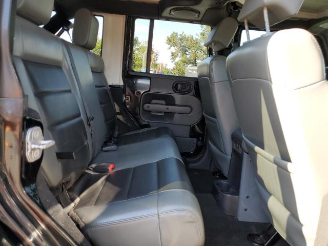 Photo 11 from auction – 2010 JEEP WRANGLER U with VIN 1J4BA5H17AL144056