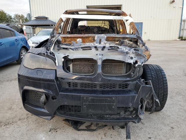 Photo 5 from auction – 2011 BMW X5 M with VIN 5YMGY0C58BLK27153