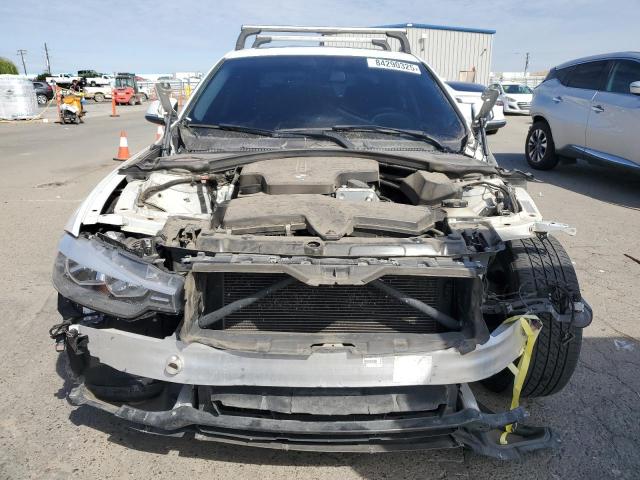 Photo 5 from auction – 2015 BMW 320 I with VIN WBA3B1G59FNT05777