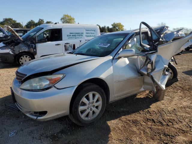 TOYOTA CAMRY LE 2003 with VIN 4T1BF30K33U563742 - Photo from auction