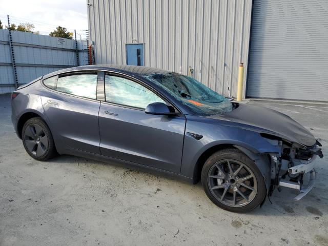 Photo 4 from auction – 2023 TESLA MODEL 3 with VIN 5YJ3E1EA2PF454610