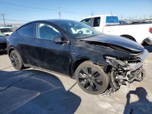 Photo 4 from auction – 2025 TESLA MODEL Y with VIN 7SAYGDED7SF313426
