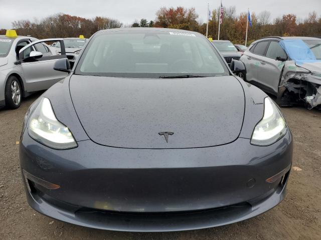Photo 5 from auction – 2023 TESLA MODEL 3 with VIN 5YJ3E1EAXPF698988