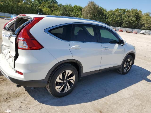 Photo 3 from auction – 2015 HONDA CR-V TOURI with VIN 5J6RM4H94FL071824