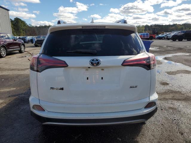 Photo 6 from auction – 2017 TOYOTA RAV4 XLE with VIN JTMWFREV3HJ147680