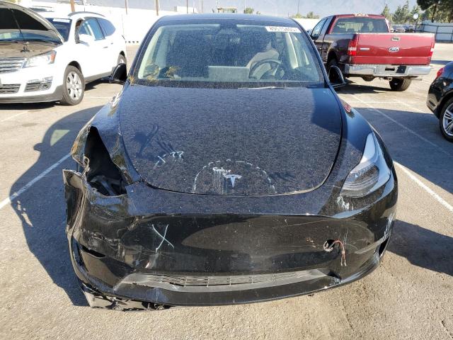Photo 5 from auction – 2023 TESLA MODEL Y with VIN 7SAYGAEE1PF795793