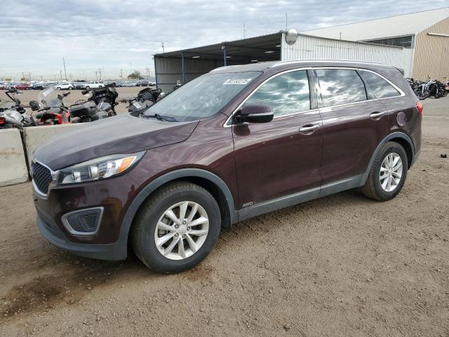 KIA SORENTO LX 2016 with VIN 5XYPGDA34GG001621 - Photo from auction