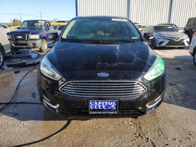 Photo 5 from auction – 2016 FORD FOCUS TITA with VIN 1FADP3J21GL245807