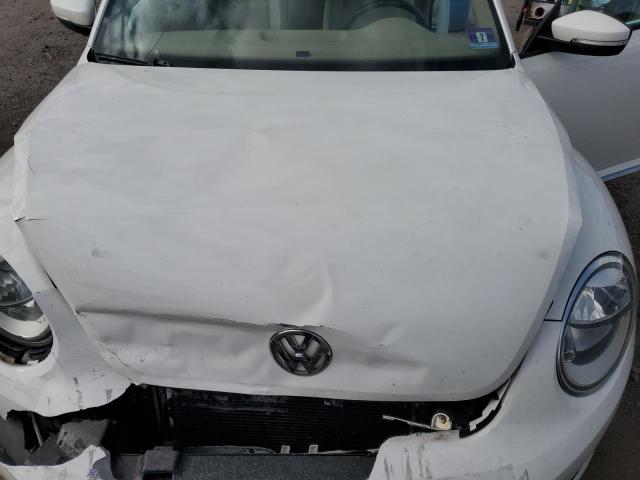 Photo 11 from auction – 2013 VOLKSWAGEN BEETLE with VIN 3VWJP7AT5DM610512