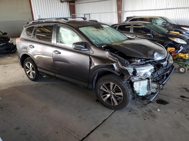 Photo 4 from auction – 2017 TOYOTA RAV4 XLE with VIN JTMWFREV5HJ710115