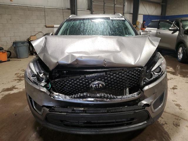 Photo 5 from auction – 2016 KIA SORENTO LX with VIN 5XYPG4A32GG145247