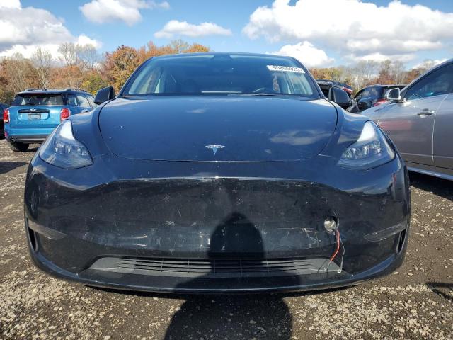Photo 5 from auction – 2023 TESLA MODEL Y with VIN 7SAYGDEF4PF765875