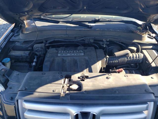 Photo 12 from auction – 2006 HONDA PILOT EX with VIN 2HKYF18706H538444