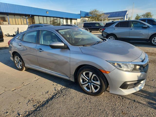 Photo 4 from auction – 2016 HONDA CIVIC LX with VIN 19XFC2F58GE026069