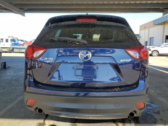 Photo 6 from auction – 2014 MAZDA CX-5 GT with VIN JM3KE4DY3E0319411
