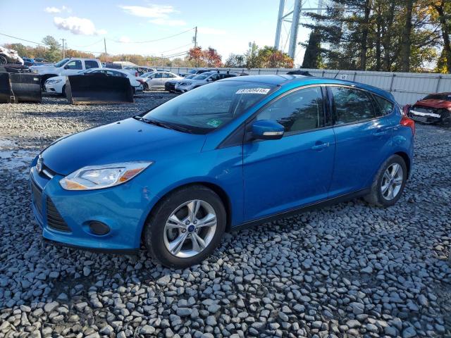 FORD FOCUS SE 2014 con VIN 1FADP3K23EL304741 - Foto de la subasta