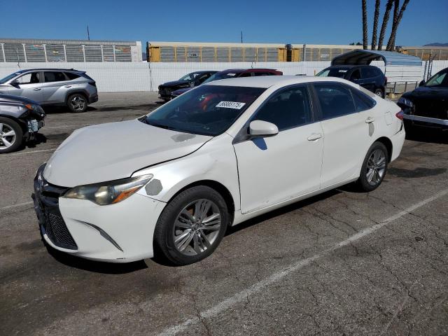 TOYOTA CAMRY LE 2015 with VIN 4T1BF1FK0FU050562 - Photo from auction
