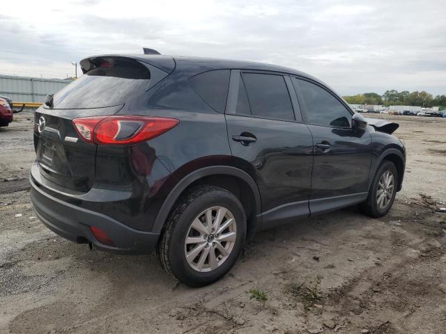 Photo 3 from auction – 2014 MAZDA CX-5 TOURING with VIN JM3KE2CY9E0320147