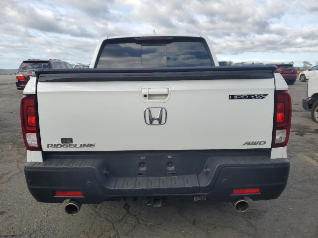 Photo 6 from auction – 2022 HONDA RIDGELINE with VIN 5FPYK3F72NB013710