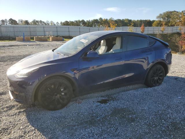 TESLA MODEL Y 2023 with VIN 7SAYGDEE3PF960017 - Photo from auction