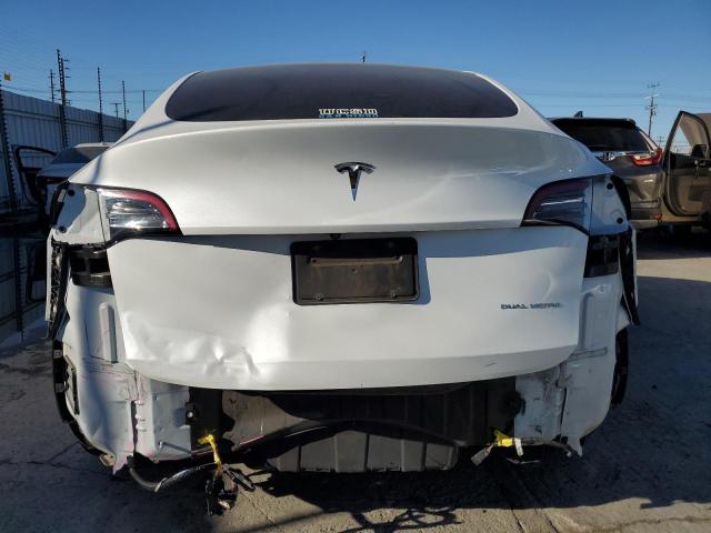 Photo 6 from auction – 2021 TESLA MODEL Y with VIN 5YJYGDEE1MF270002