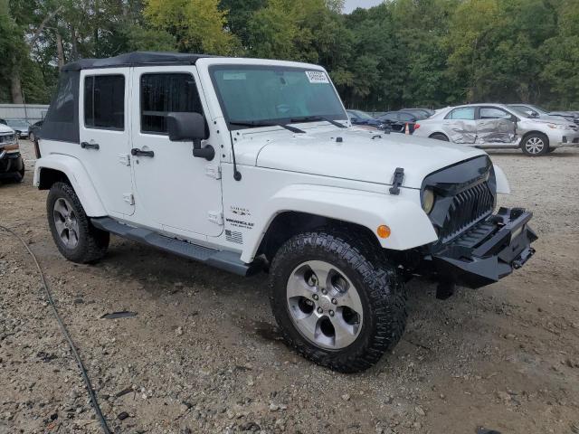 Photo 4 from auction – 2016 JEEP WRANGLER U with VIN 1C4BJWEG8GL243157
