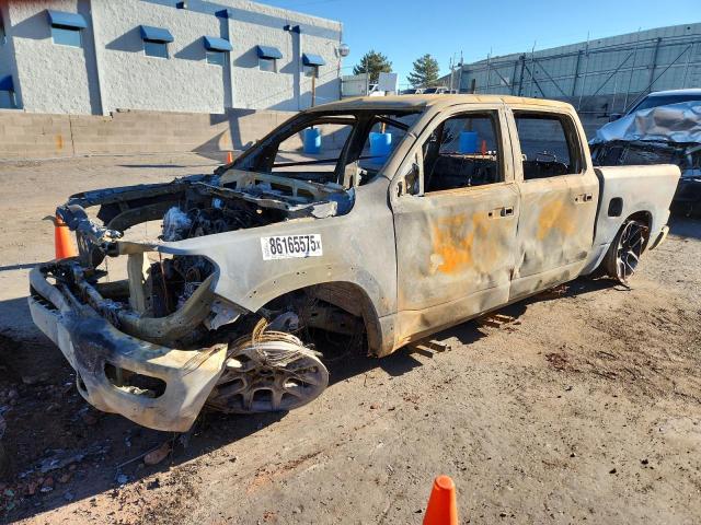 RAM 1500 LARAM 2021 with VIN 1C6SRFJM6MN696933 - Photo from auction