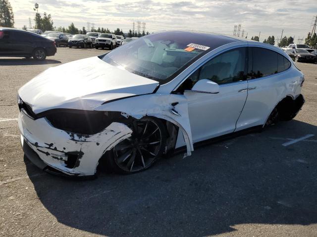TESLA MODEL X 2018 with VIN 5YJXCAE23JF113630 - Photo from auction