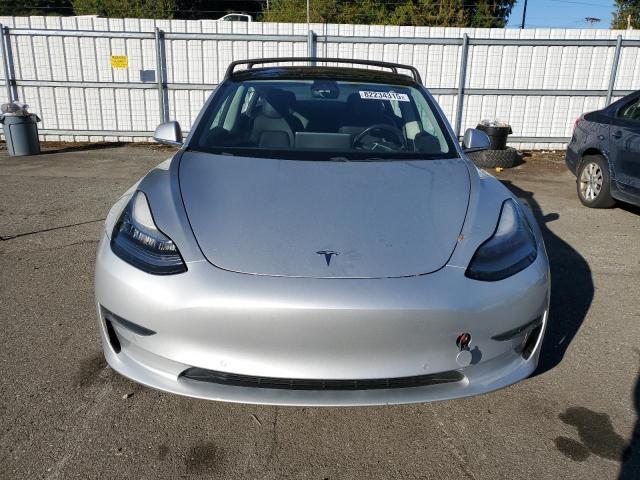 Photo 5 from auction – 2018 TESLA MODEL 3 with VIN 5YJ3E1EB8JF084327