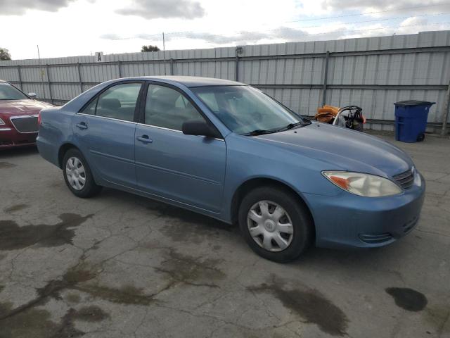 Photo 4 from auction – 2002 TOYOTA CAMRY LE with VIN JTDBE32K420006493