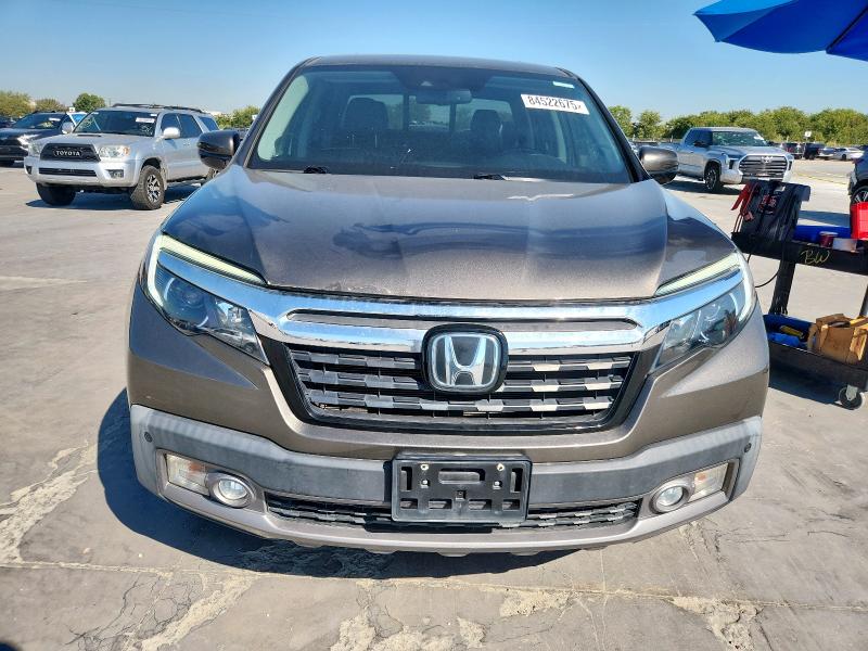 Photo 5 from auction – 2020 HONDA RIDGELINE with VIN 5FPYK3F72LB011694